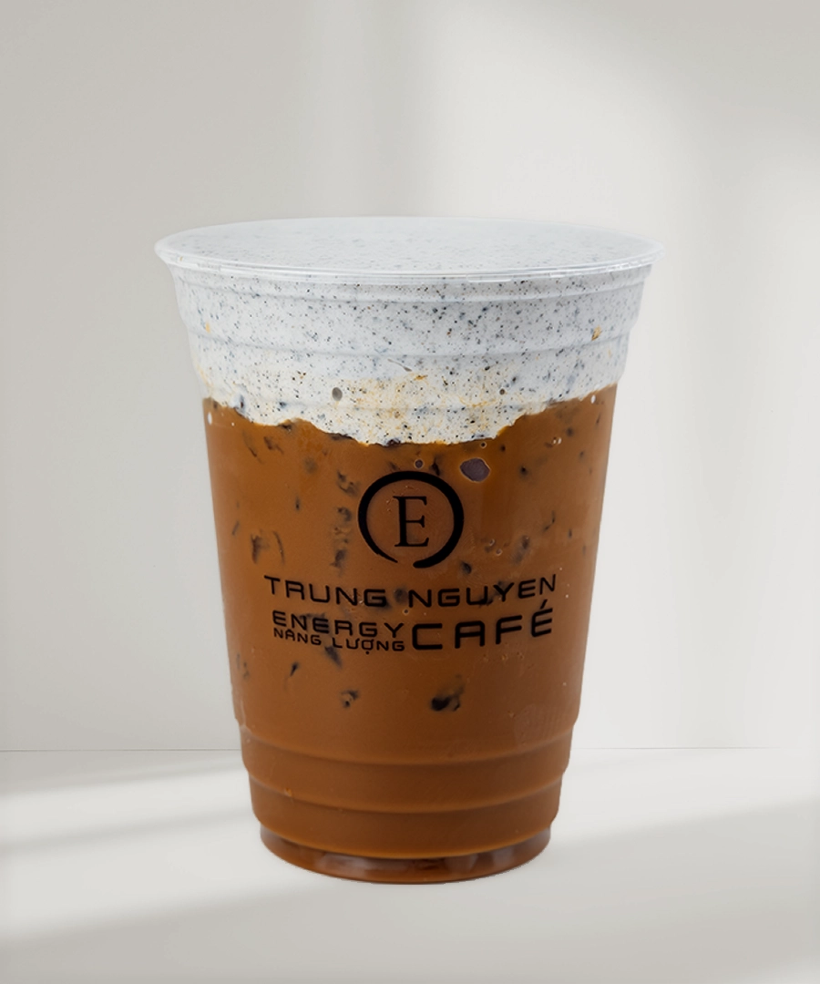 Trung Nguyên E-Coffee signature specialty drink in a clear plastic cup, showcasing unique foam