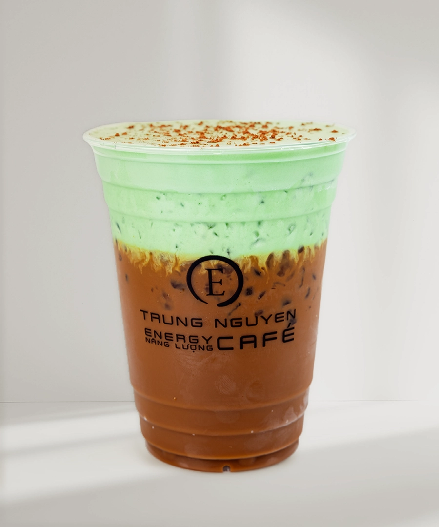 Trung Nguyên E-Coffee signature specialty drink in a clear plastic cup, showcasing unique foam